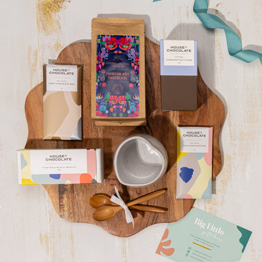 A premium thank-you gift box with artisan chocolate, bonbons, and hot chocolate. A perfect way to show appreciation!