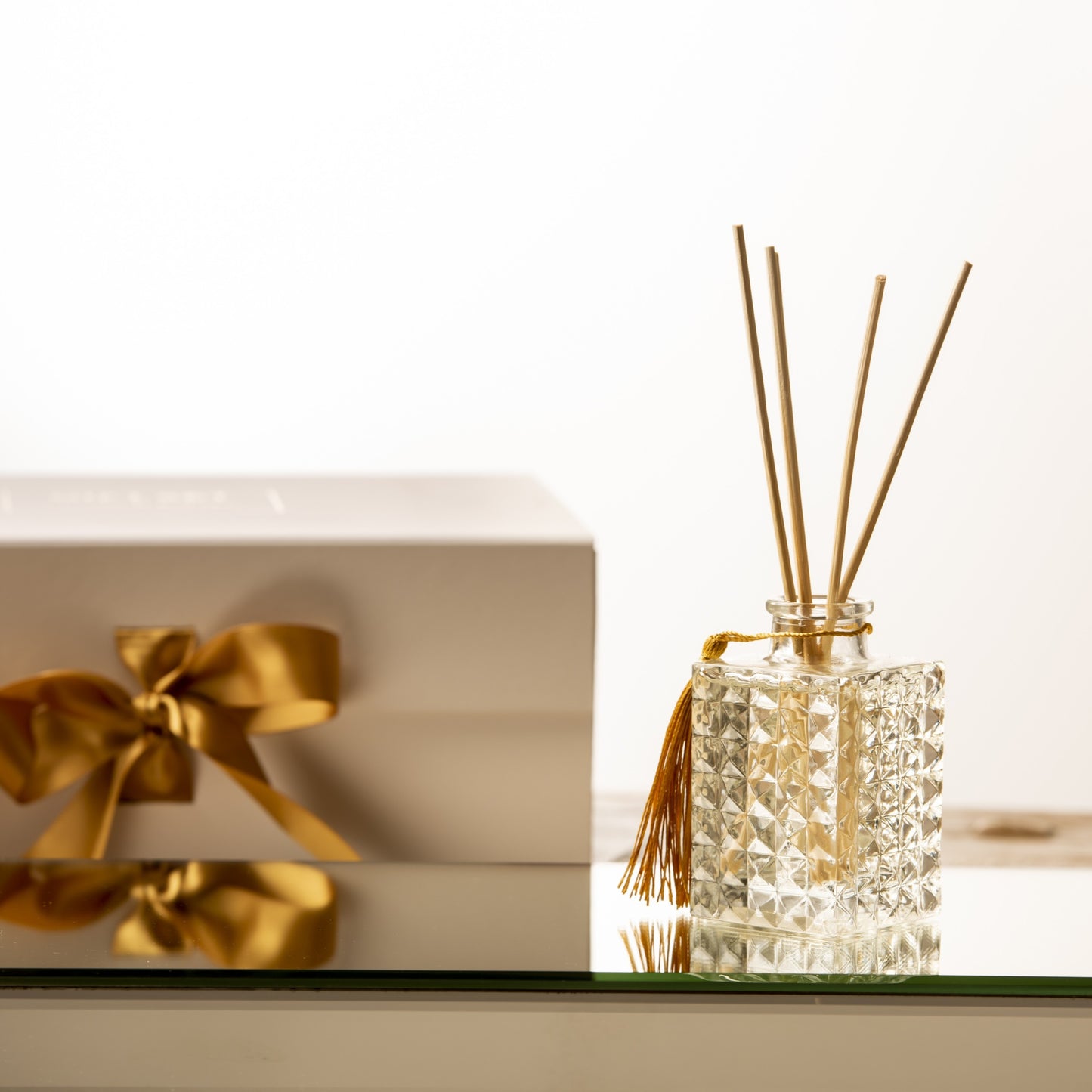 Elegant 100ml glass reed diffuser. NZ made, long-lasting fragrance. A flameless gift for home, office, or a special treat.