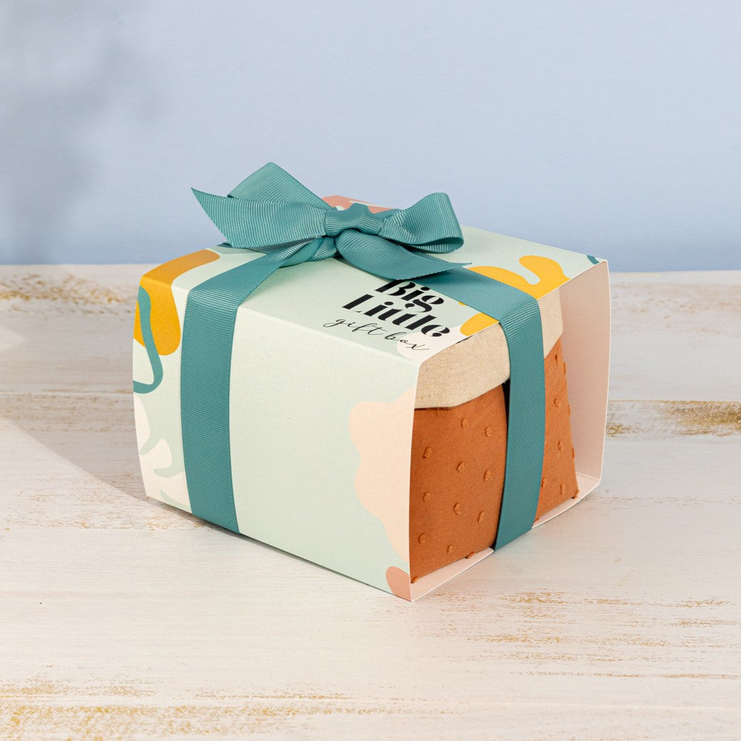 A honey-infused thank-you gift box with natural self-care treats and artisan chocolate. A sweet way to show appreciation!