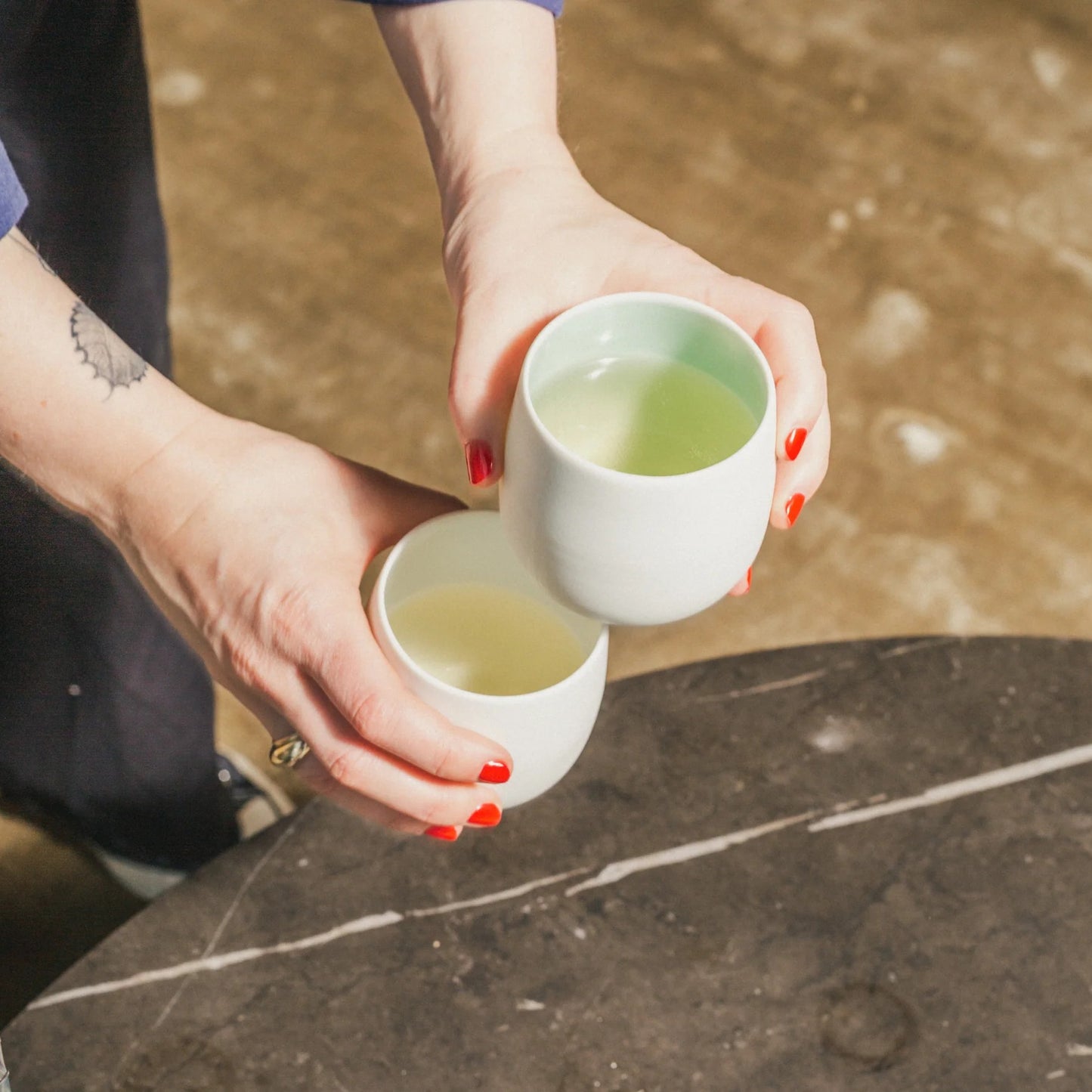 A handcrafted-style porcelain cup in Feijoa green. Beautiful, durable, and perfect for your next Gift Box NZ.
