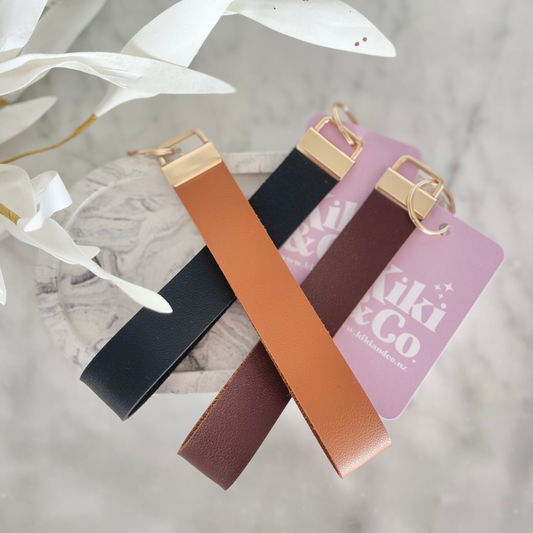 A selection of stylish faux leather keychains handmade in Nelson, New Zealand by Kiki & Co. Kiki & Co keychains are fabulous when you are busy and on the go. They fit easily over your wrist which is so good when your hands are full. They look super cute and never get lost in your handbag.