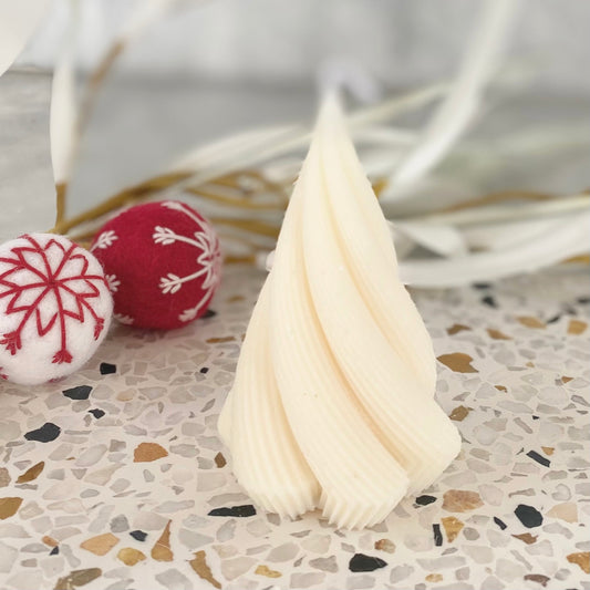 Gift Box NZ | New Zealand made products | Small gift boxes NZ | Gift in New Zealand   This festive hand poured Christmas tree shaped candle is handmade in Nelson, New Zealand by EM & ME Candles. This is a gingerbread scented soy wax blend candle in a white colour.