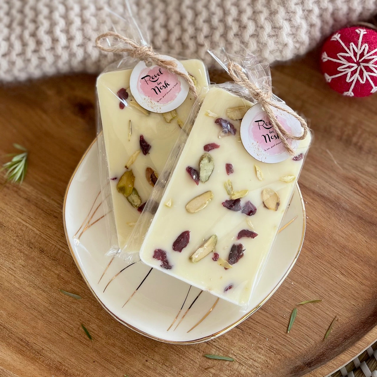 Indulge in our handcrafted cranberry & pistachio white chocolate bar from NZ. Perfect for a gift box NZ or a delicious treat!