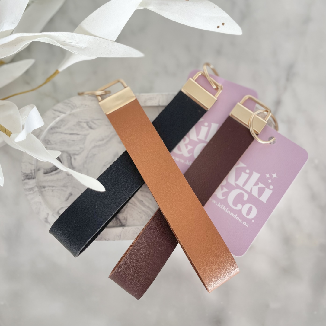 A selection of stylish faux leather keychains handmade in Nelson, New Zealand by Kiki & Co. Kiki & Co keychains are fabulous when you are busy and on the go. They fit easily over your wrist which is so good when your hands are full. They look super cute and never get lost in your handbag. 